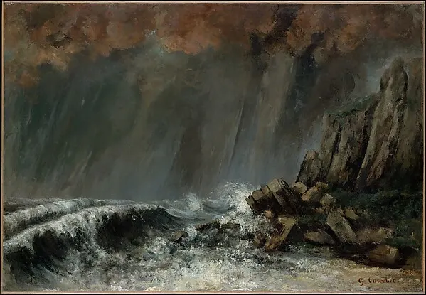 A dark stormy sea with a white wave breaking on rocks under heavy clouds