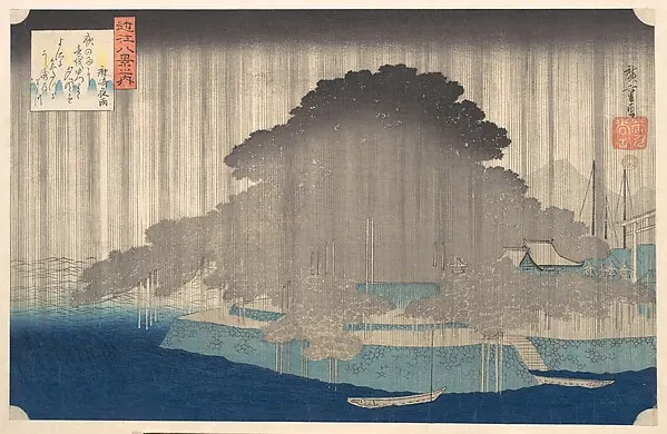 A heavy dark rain cloud above a pine tree and a strip of blue lake water