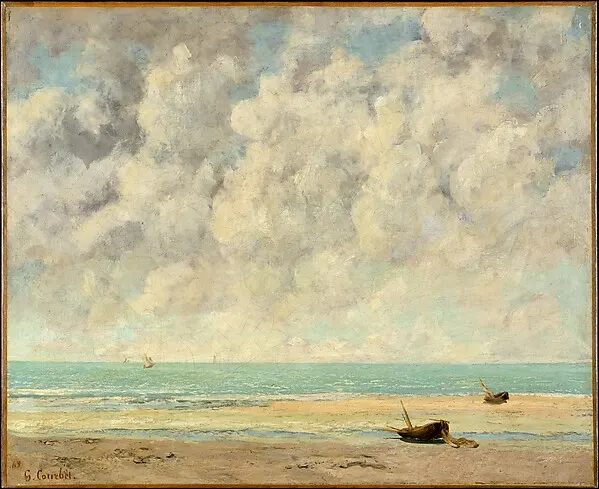 A large cloudy sky over a flat sea and sandy beach with a small boat